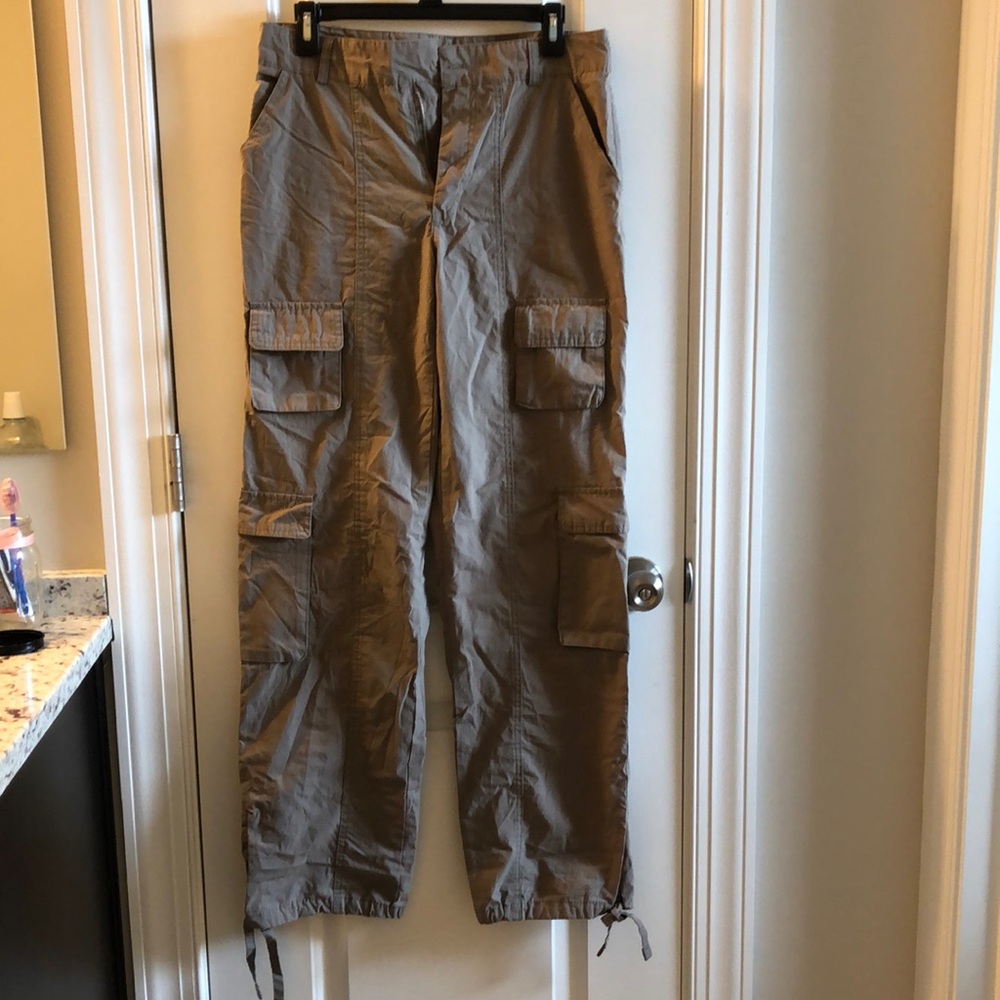 Cargo pants with drawstring leg holes